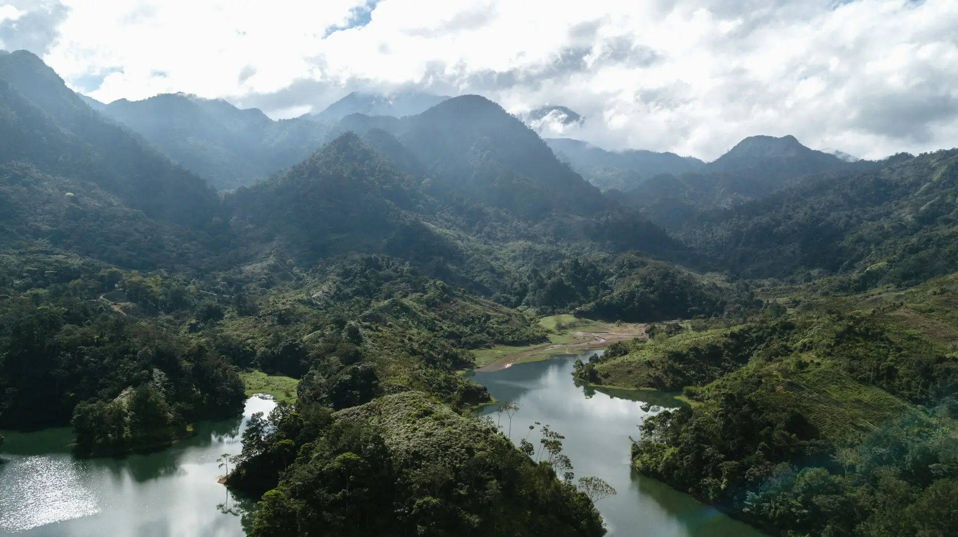 Forested mountains and a winding lake near Santa Cruz de Yojoa, Honduras